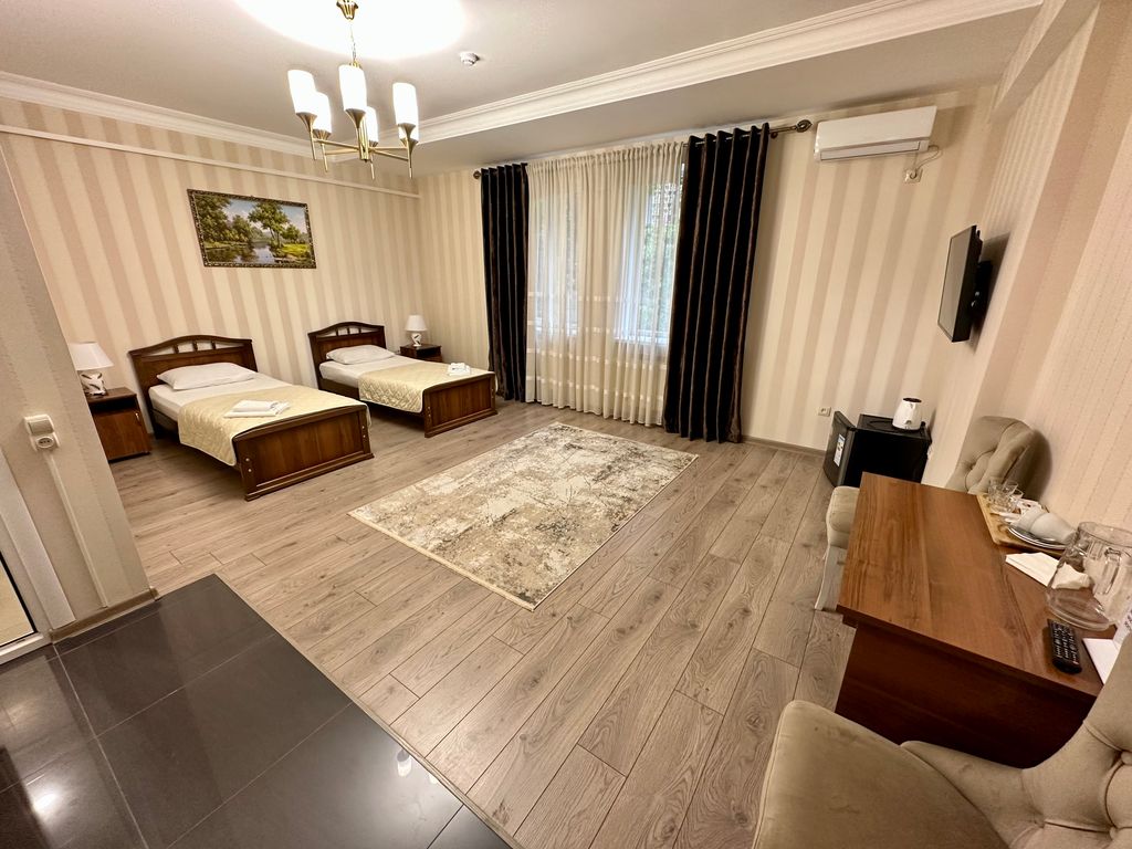 Восток — Двухместный номер с 2 отдельными кроватями стандартный