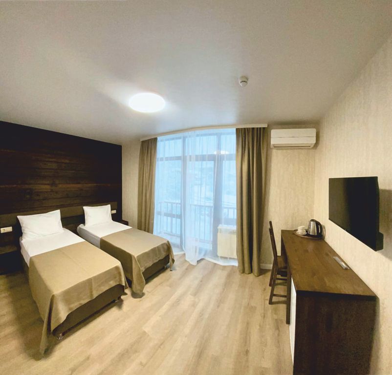 Альпийский двор — Двухместный номер с 2 отдельными кроватями Стандарт с балконом