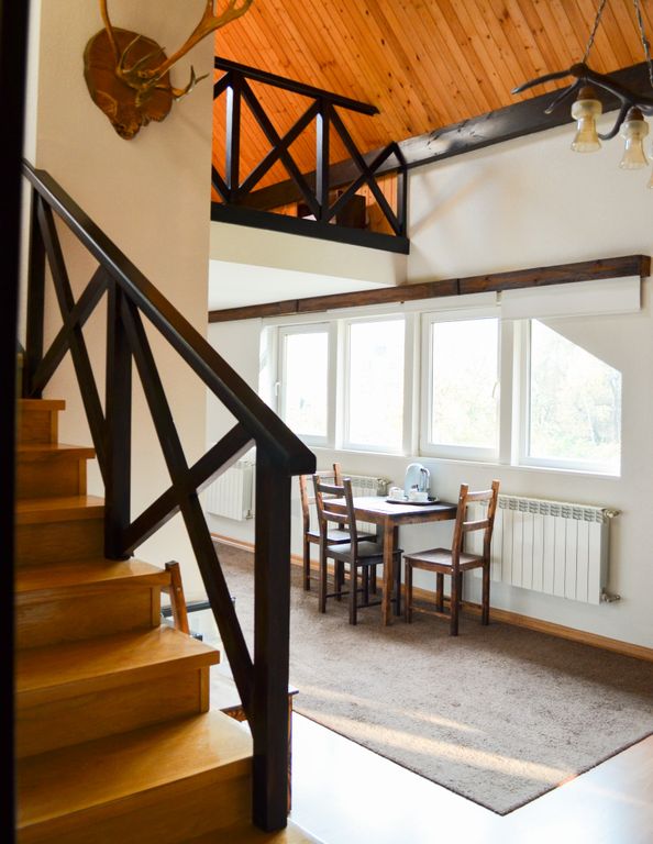 Альпийский двор — Четырёхместный номер двухуровневый люкс