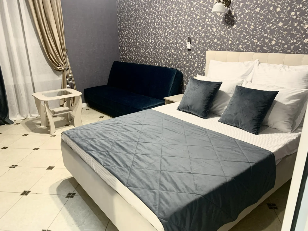 Сакура — Четырёхместный номер Стандарт улучшенный с кухней и террасой