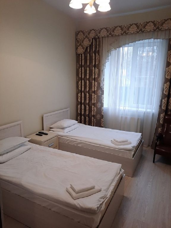 Sairan — Четырёхместный номер двухкомнатный стандартный номер