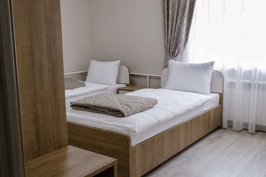 Care — Двухместный номер с 2 отдельными кроватями стандарт