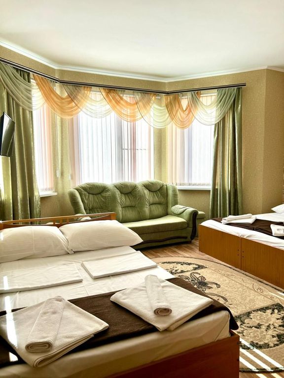 Karolina — Четырёхместный номер  с видом на сад