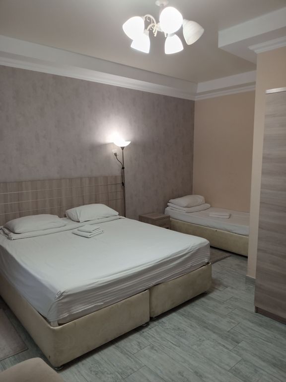 Paradis — Трёхместный номер Трёхместный номер с одной двуспальной и одной односпальной кроватями