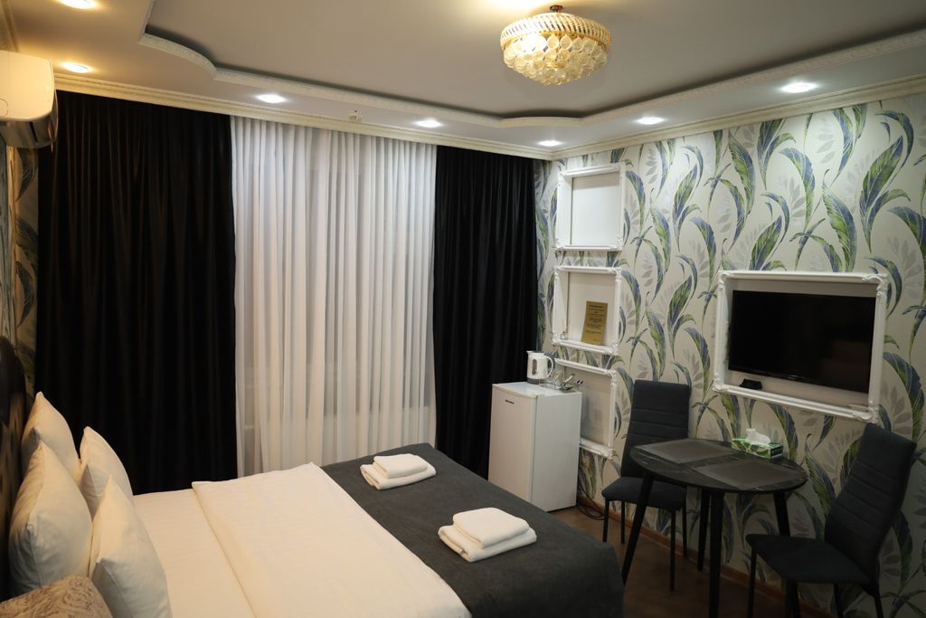 Бута — Трёхместный номер улучшенный