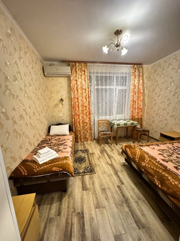 Доронин — Двухместный номер с 2 отдельными кроватями с дополнительным местом