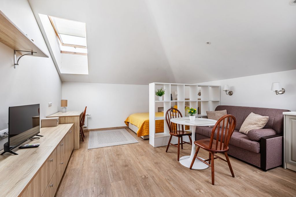 В сердце города — Апартаменты комфорт мансарда