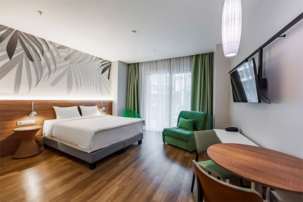 Космос Стей Ле Ронд Сочи — Семейный номер студия с видом на патио