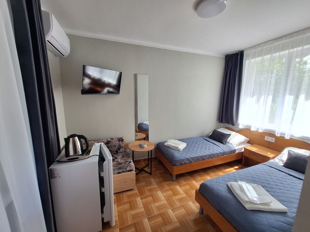 Цитрус — Двухместный номер с 2 отдельными кроватями улучшенный с видом на горы