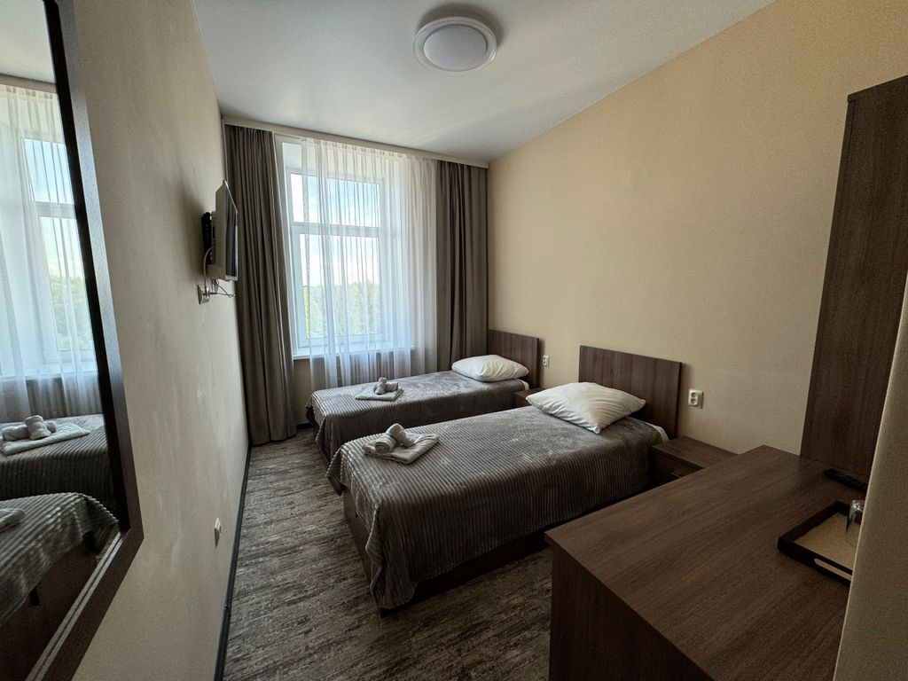 Митино — Двухместный номер с 2 отдельными кроватями улучшенный стандарт без балкона с двумя 1,5 сп, кроватями