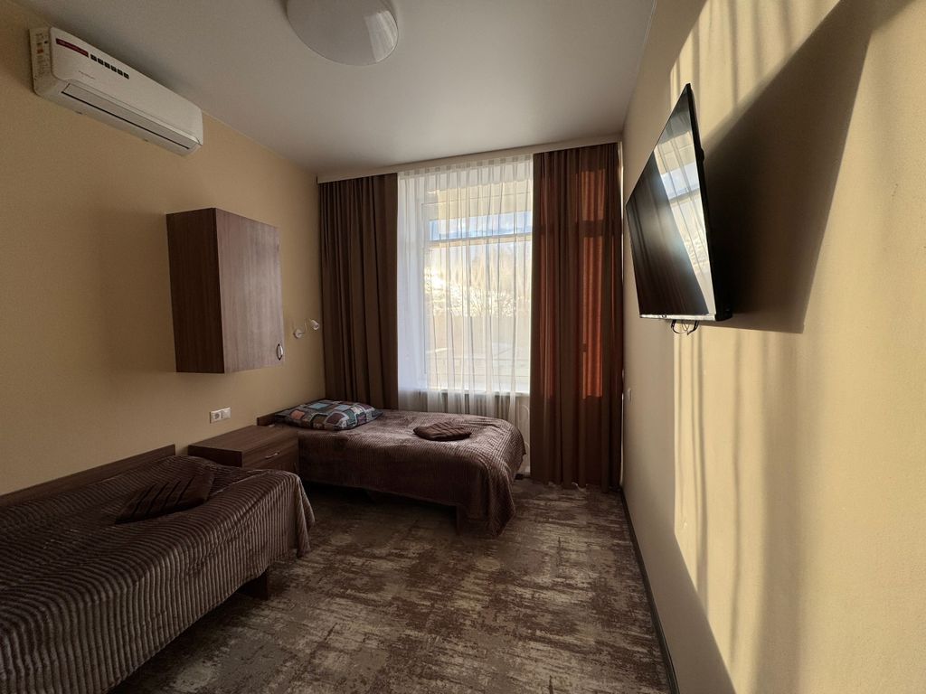 Митино — Двухместный номер с 2 отдельными кроватями улучшенный стандарт с балконом