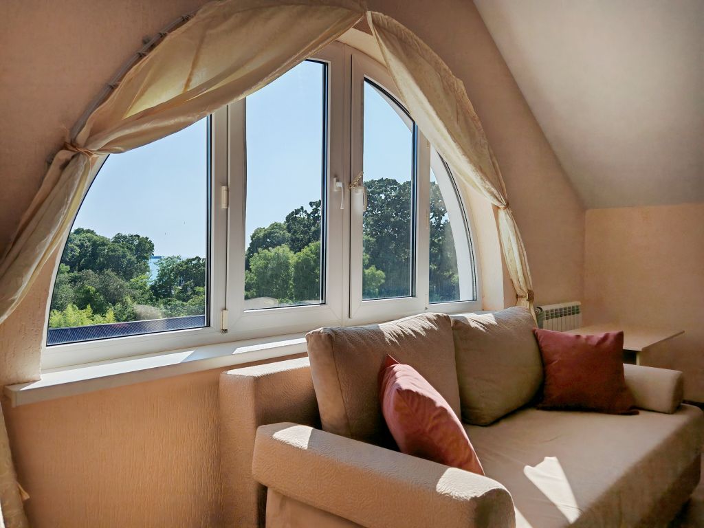 Шоколад — Семейный номер Пятиместный номер с красивым видом (частичный вид на море)