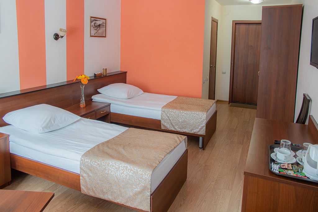 Космос — Двухместный номер с 2 отдельными кроватями с диваном